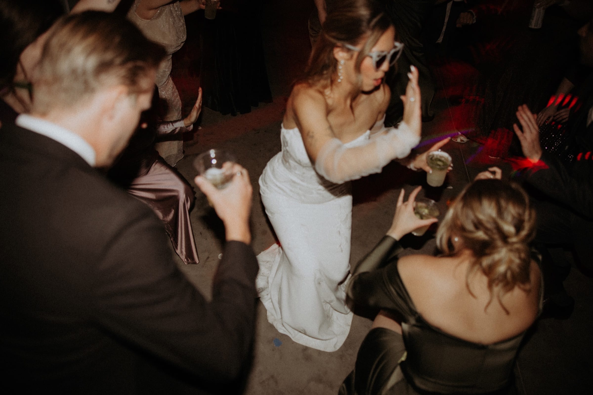 Documentary wedding scene from Carder and Sierra's Magnolia Farms wedding in Van Meter, Iowa