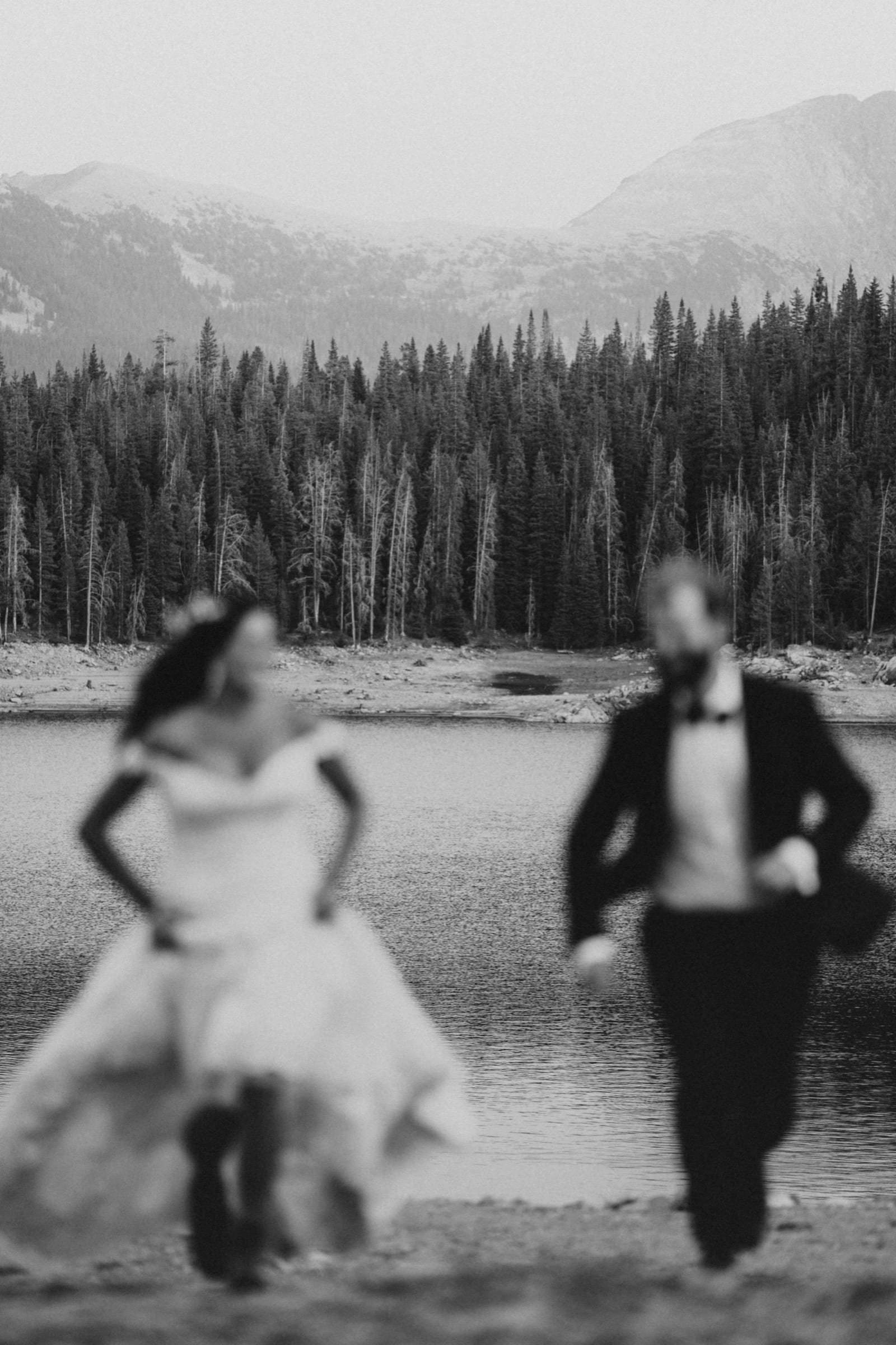 Candid wedding moment from Sam and Savanna's mountain wedding in Winter Park, Colorado