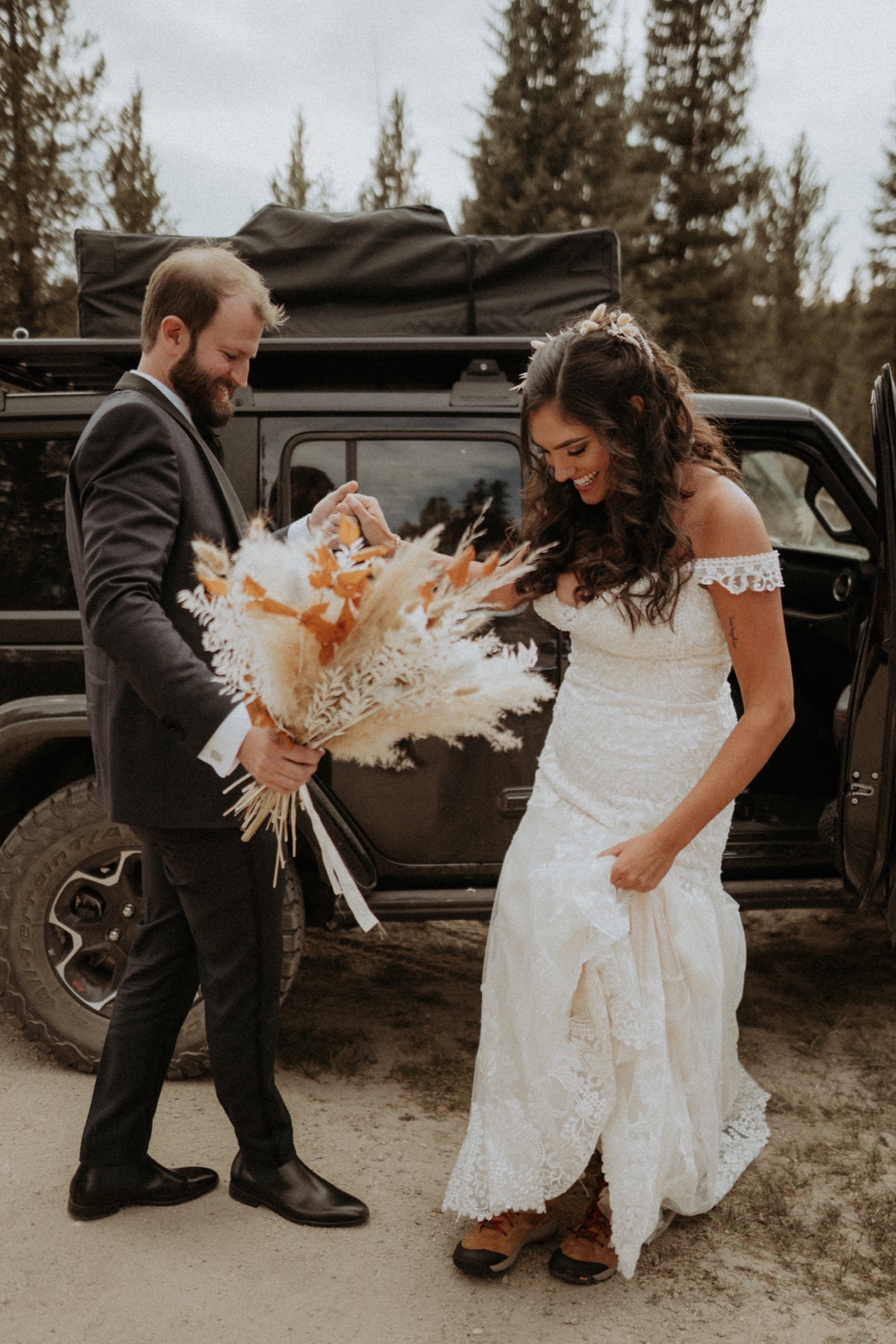 Candid wedding moment from Sam and Savanna's mountain wedding in Winter Park, Colorado