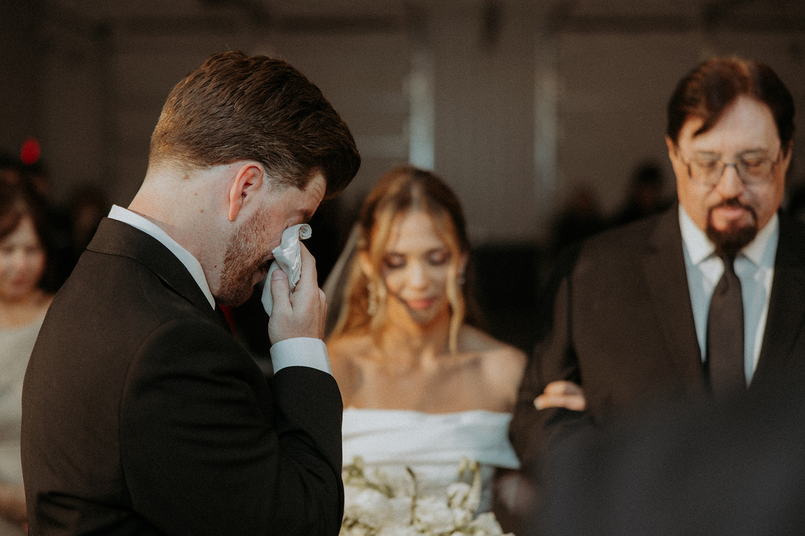 Carder becoming emotional beside Sierra during their wedding ceremony