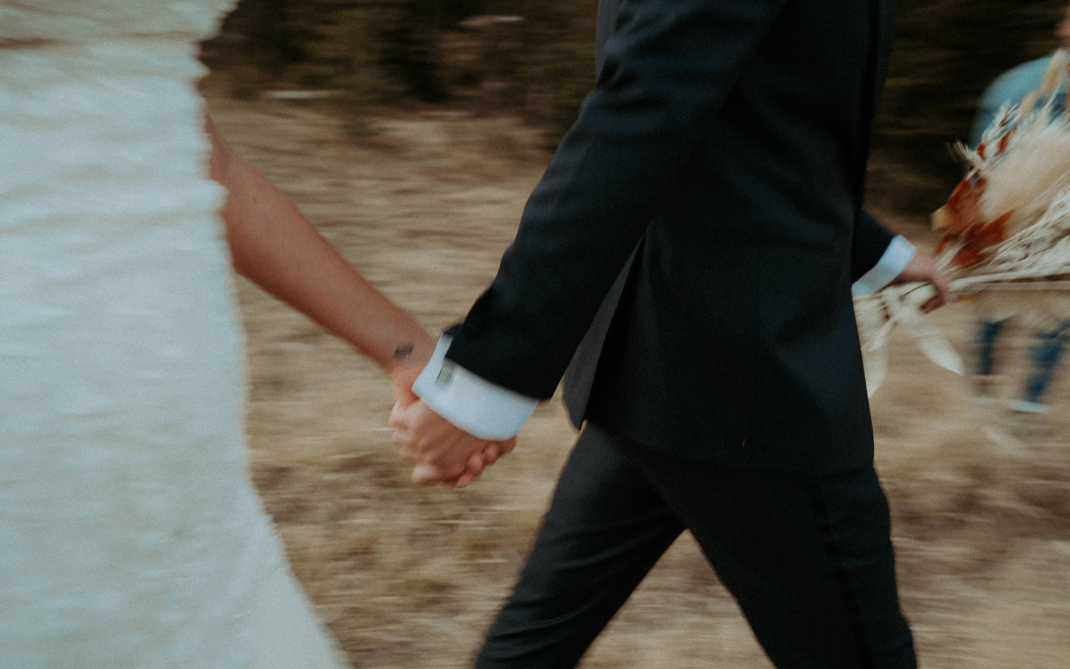 Holding hands on the lakeshore