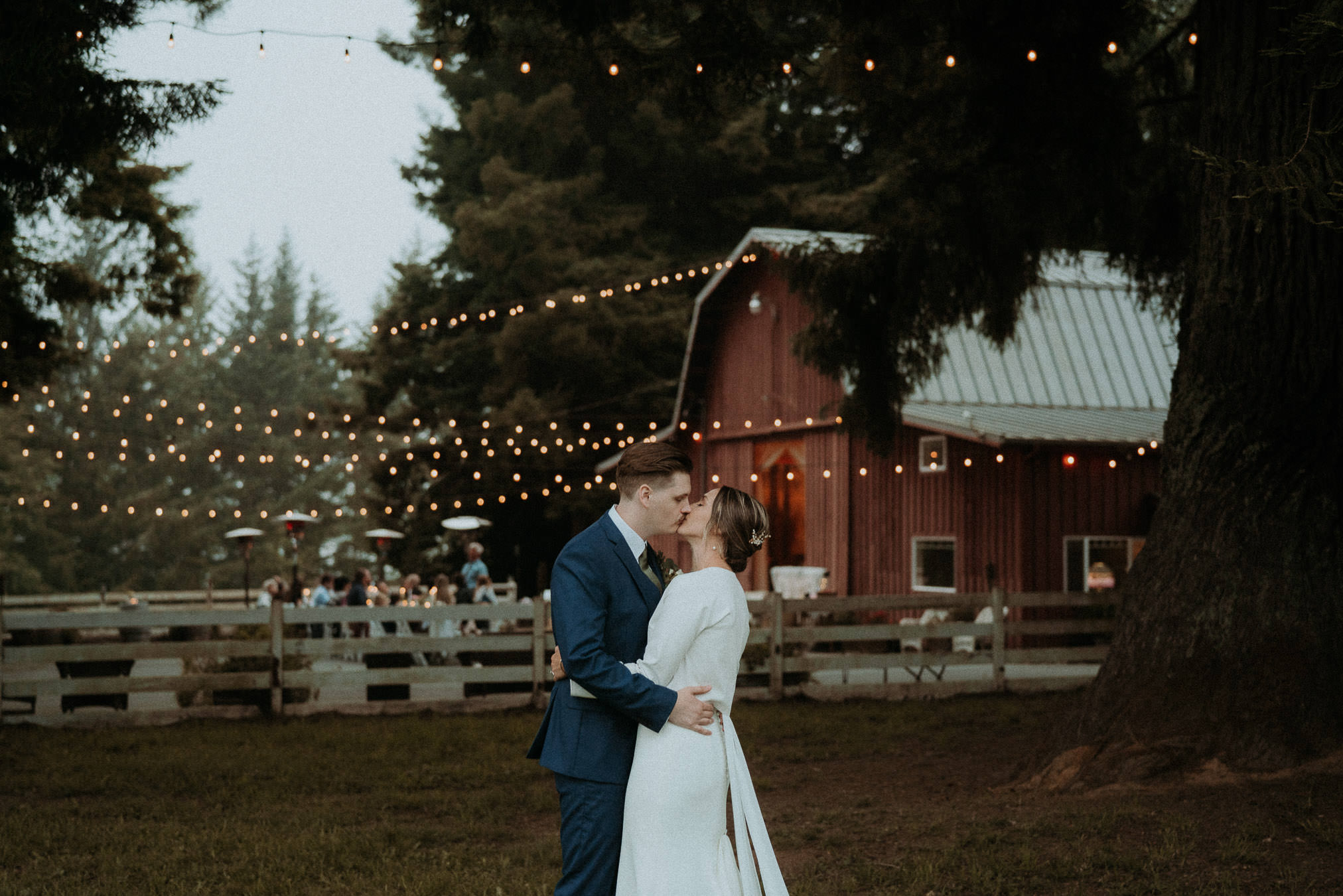 Outside the reception under string lights