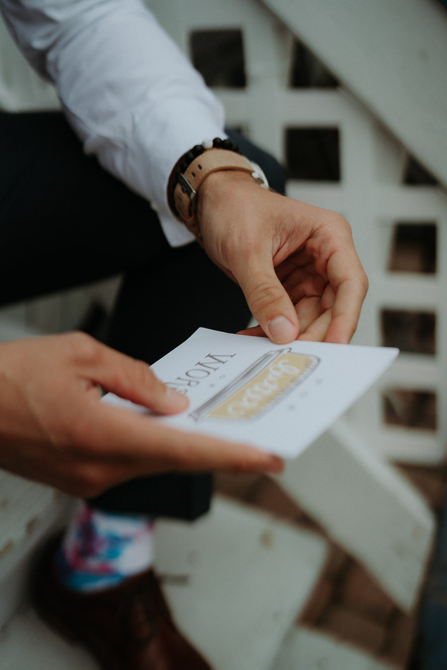 A groom writing his vows